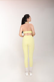 FLOW HALTER NECK SPORTS BRA IN BUTTERCUP