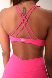 EFFORTLESS TWIST FRONT SPORTS BRA IN FUCHSIA PINK